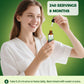 Woman adding oregano oil drops into water for daily immune and digestive support